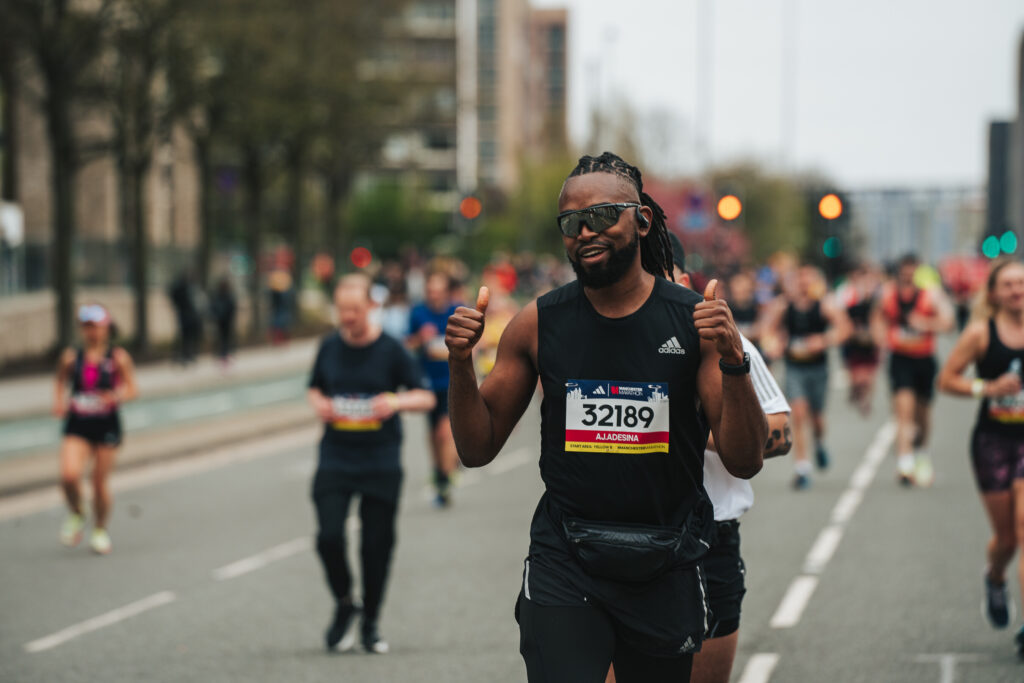 A runner giving thumbs up