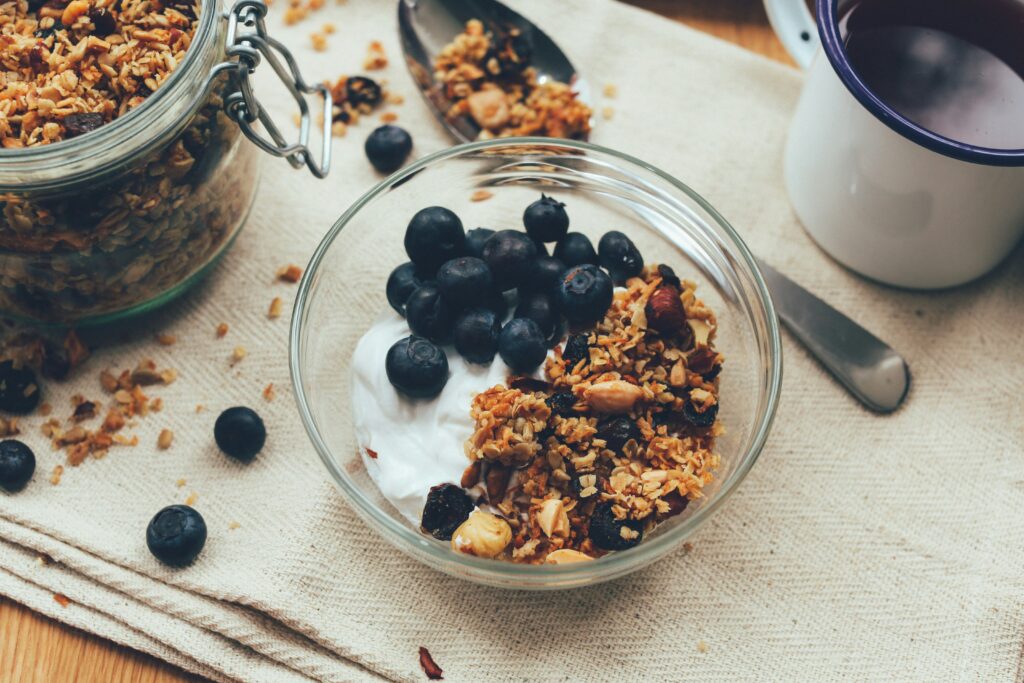 Breakfast of granola and blueberries before a run.